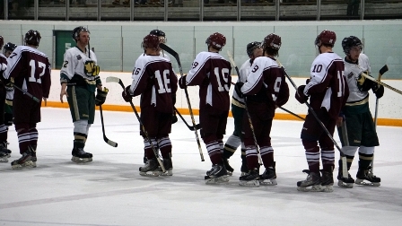 1516mercsmaroonshandshake.jpg 1516mercsmaroonshandshake.jpg